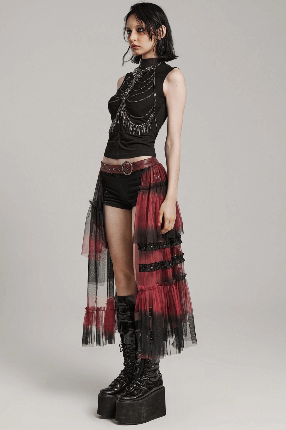 Gothic half skirt asymmetrical design close-up showing layered mesh and staggered ruffle pattern
