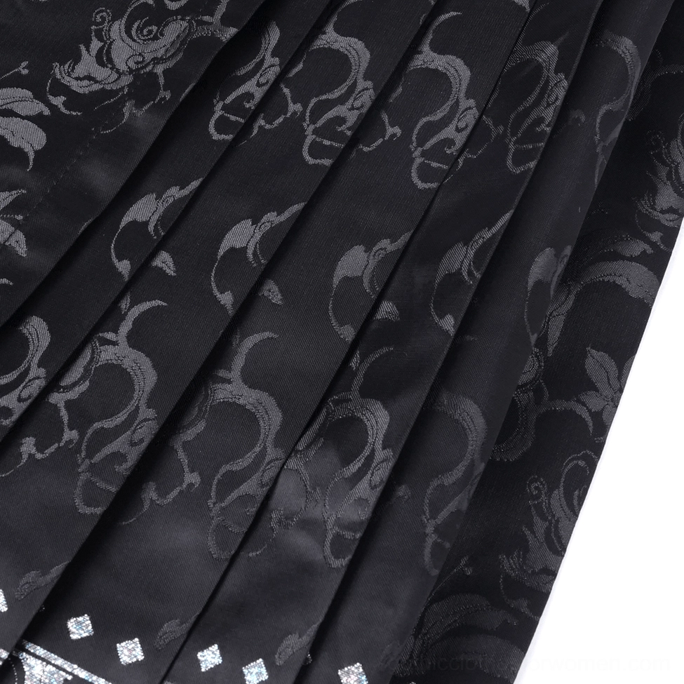 Black gothic maxi skirt detail view showing beaded trim work, silver embroidery and premium jacquard weave construction
