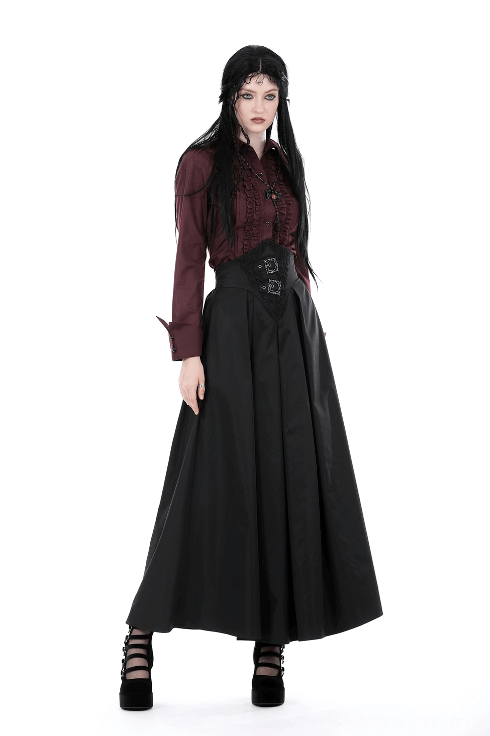 Black gothic A-line skirt styled detail showing the corset waist belt with ornamental buckles and elegant drape