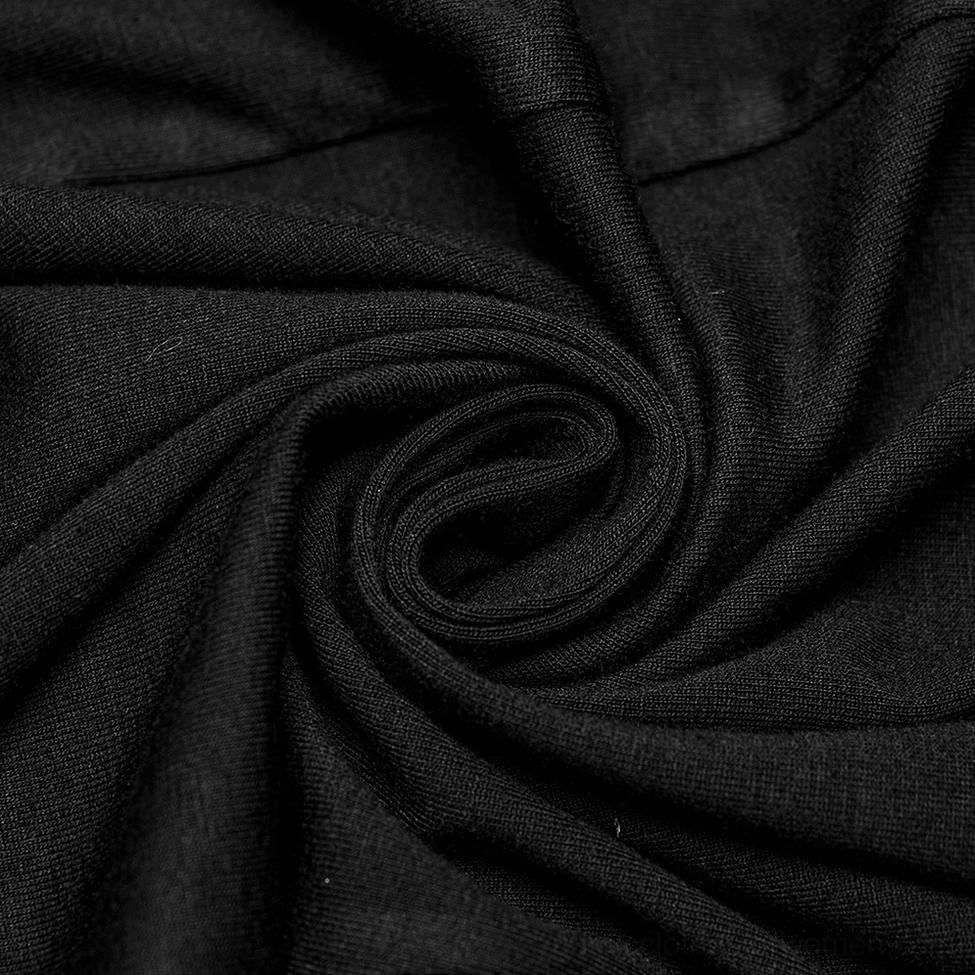 Close-up of stretchy solid black knitted base fabric of gothic skirt showing drape and elasticity