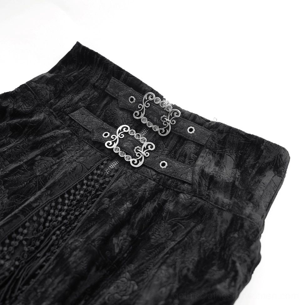 Close-up detail of gothic skirt corset waistband showing vintage silver metal buckles and embossed floral velvet texture