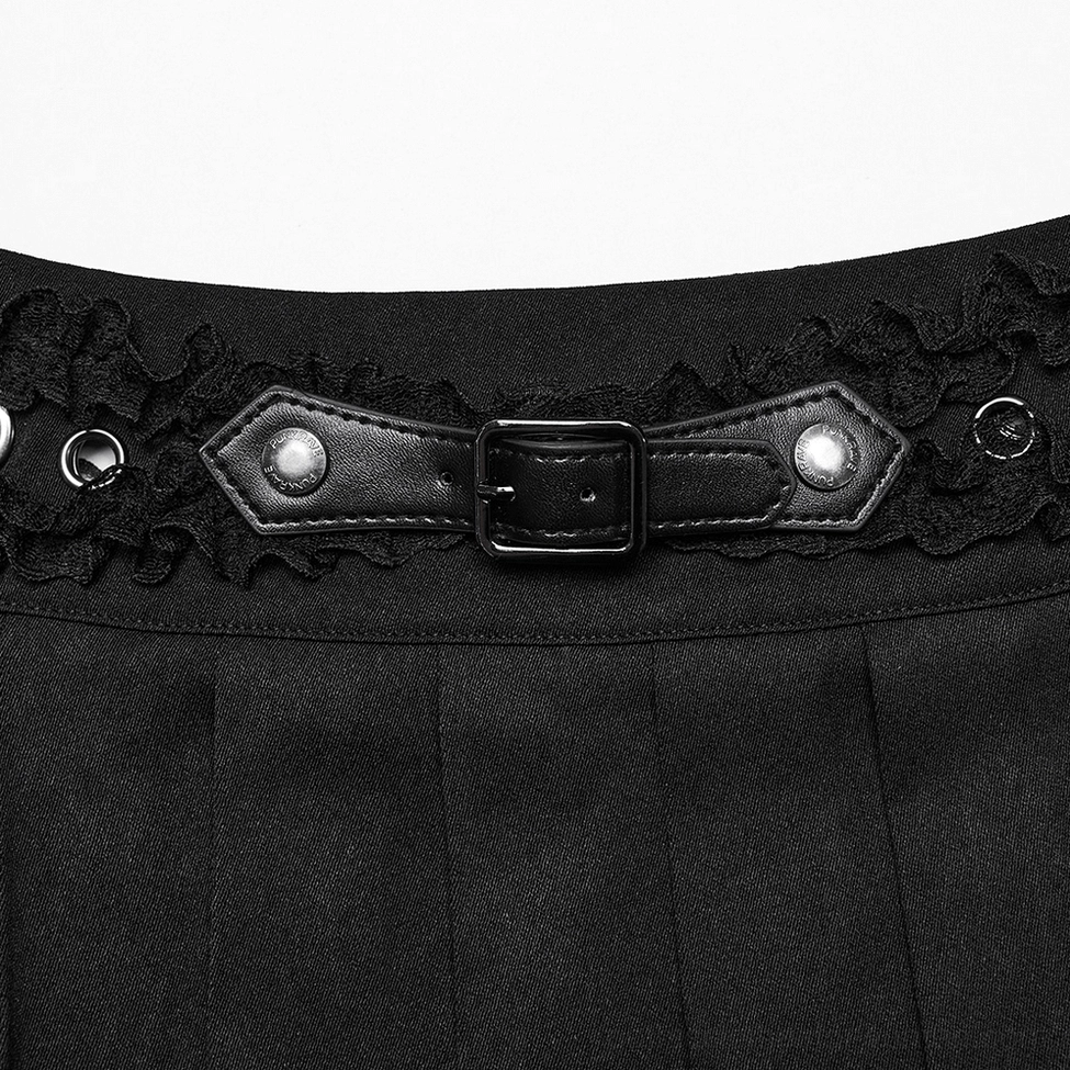 Detailed close-up of black gothic mini skirt waistband featuring leather belt buckle, metal fasteners, and delicate lace edging