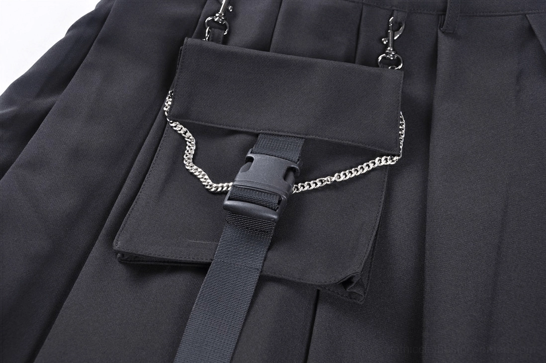 Black gothic mini skirt chain pocket close-up showing metal chain trim and plastic buckle attachment