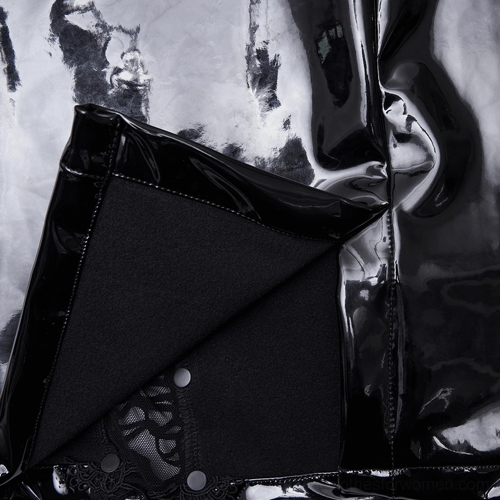 Close-up shot of black gothic skirt snap button closure and inner cotton lining detail