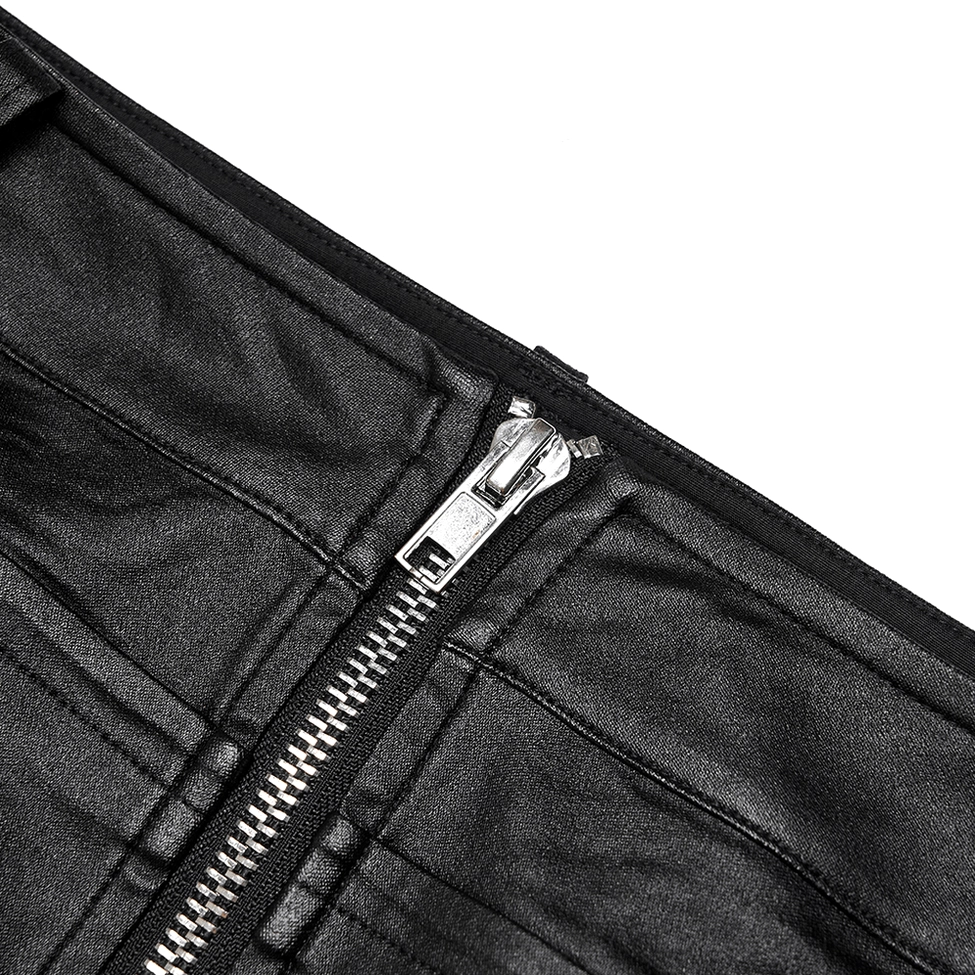 Close-up detail of silver metal dual-head zipper slider and teeth on black faux leather gothic skirt