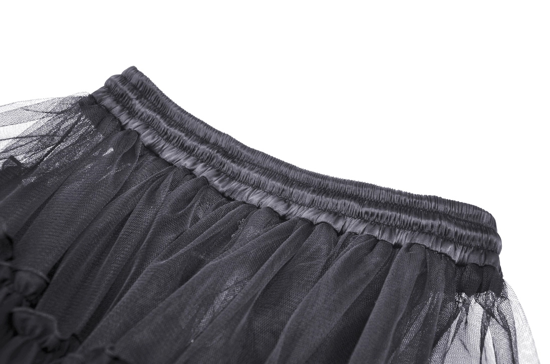 Close-up of gothic skirt elastic waistband trim with attached ruffled black tulle construction detail