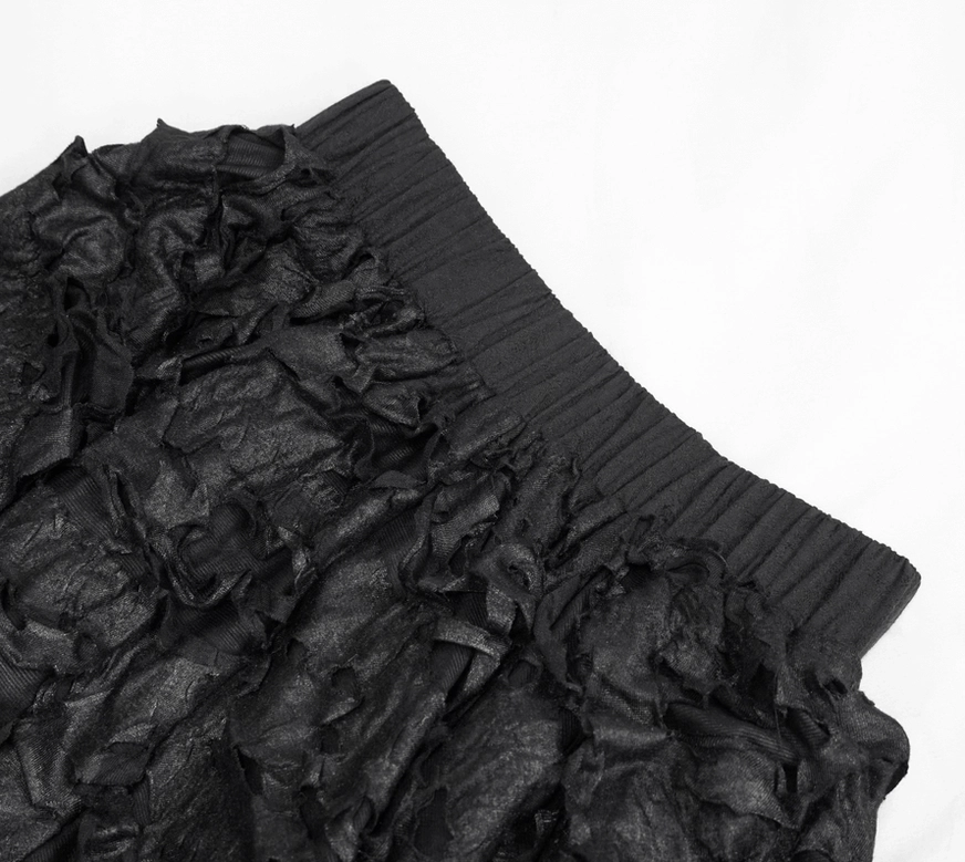 Gothic skirt waistband close-up detail, ribbed elastic waist, textured ruffled knit fabric, alternative fashion sizing