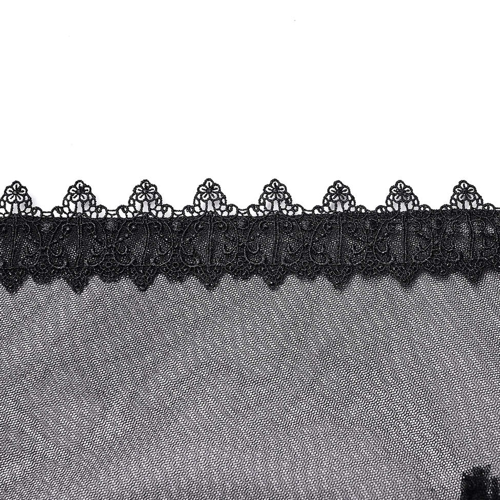 Close-up detail of black gothic skirt showing floral embroidered lace trim and sheer mesh base fabric