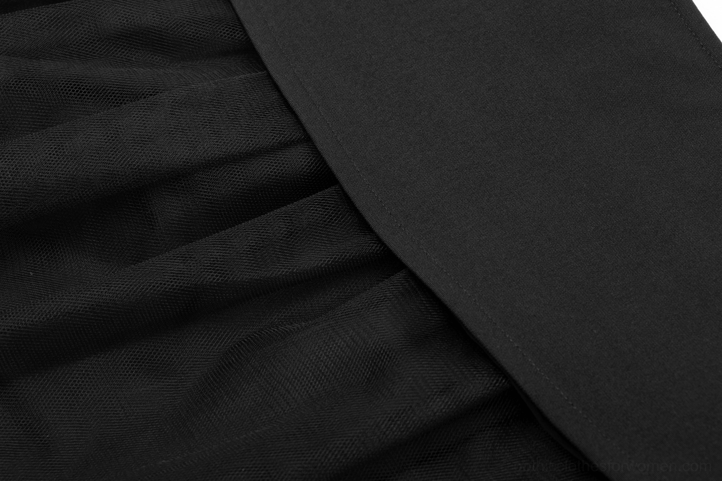 Black gothic skirt woven fabric texture close-up showing polyester weave and soft chiffon lining detail