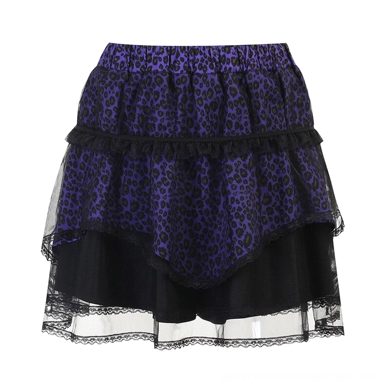 Flat lay overhead view of purple and black leopard print gothic skirt showing asymmetrical hem and lace trim details