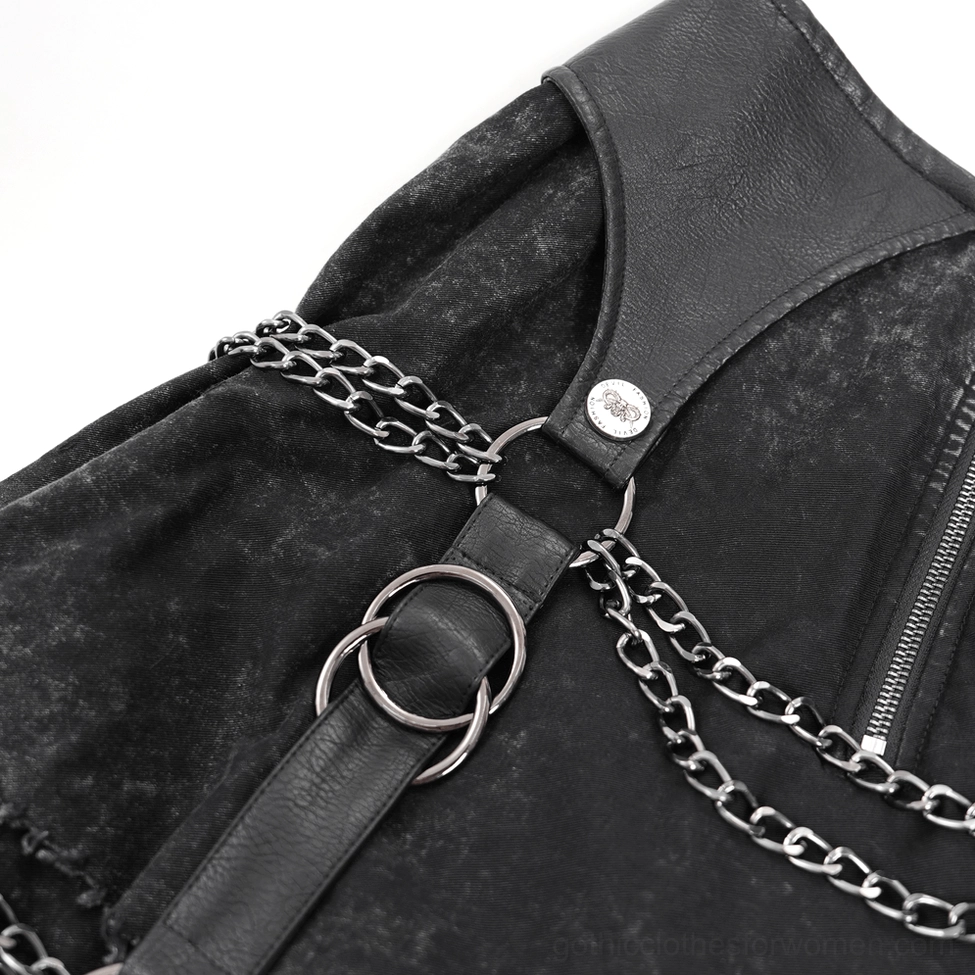 Close-up detail of black gothic skirt hardware showing metal chains D-rings and silver chain decorations