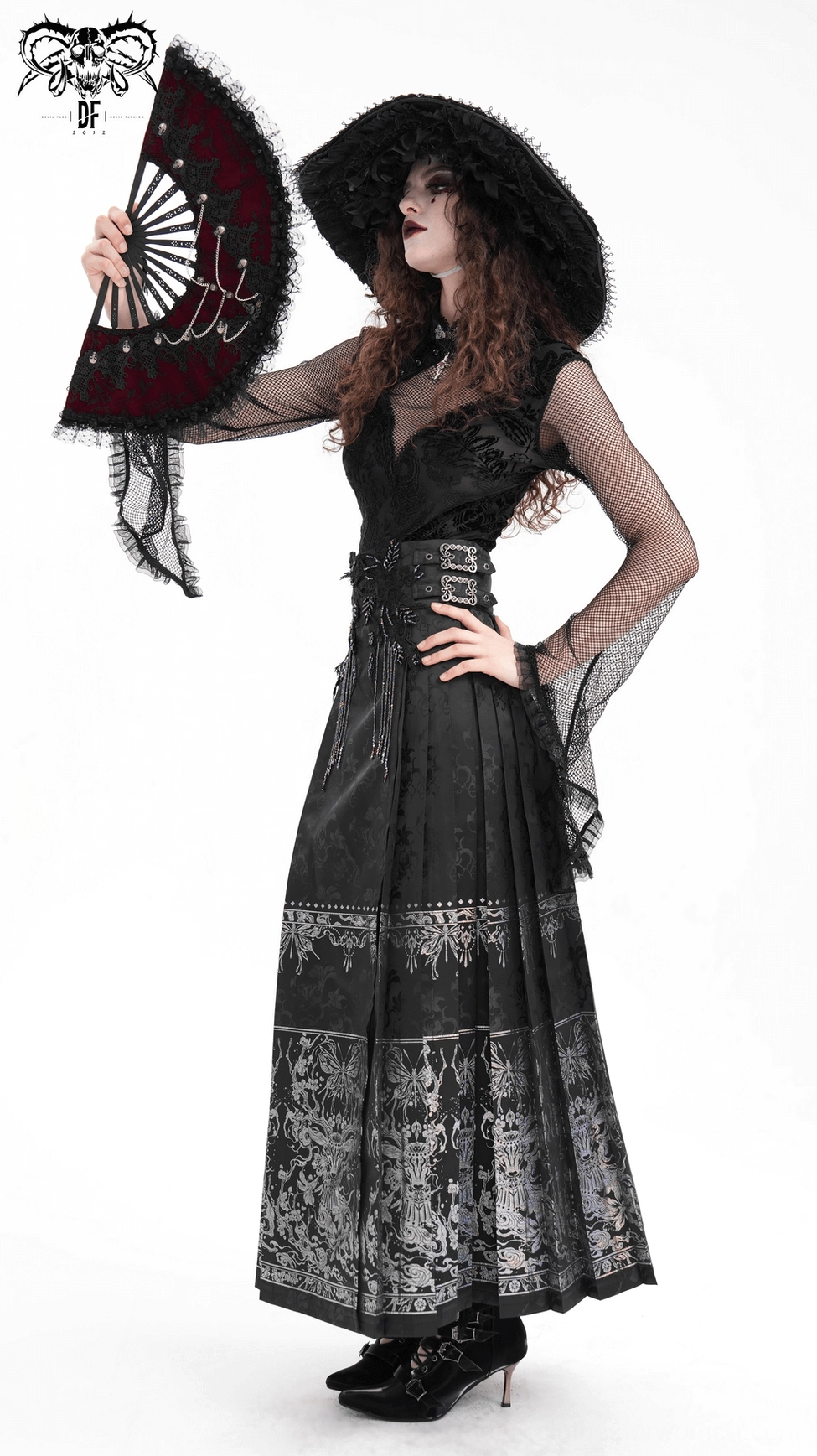 Black gothic maxi skirt bottom hem detail showing quality construction and finishing with embroidery and beaded trim edges