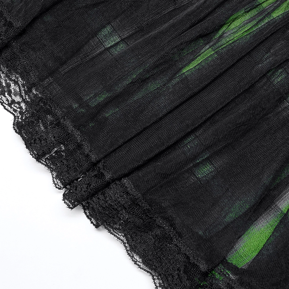 Macro detail shot of black lace trim hem on pleated tartan gothic skirt