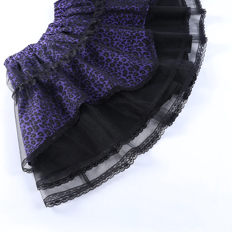 Detail shot of gothic skirt lace trim and tulle overlay showing craftsmanship and material quality