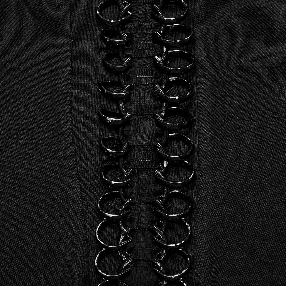 Close-up detail of black gothic skirt lace-up hardware with metal rings and black fabric base