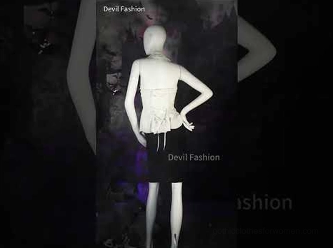 Gothic black embroidered skirt displayed on mannequin showing back lace-up corset design and structure