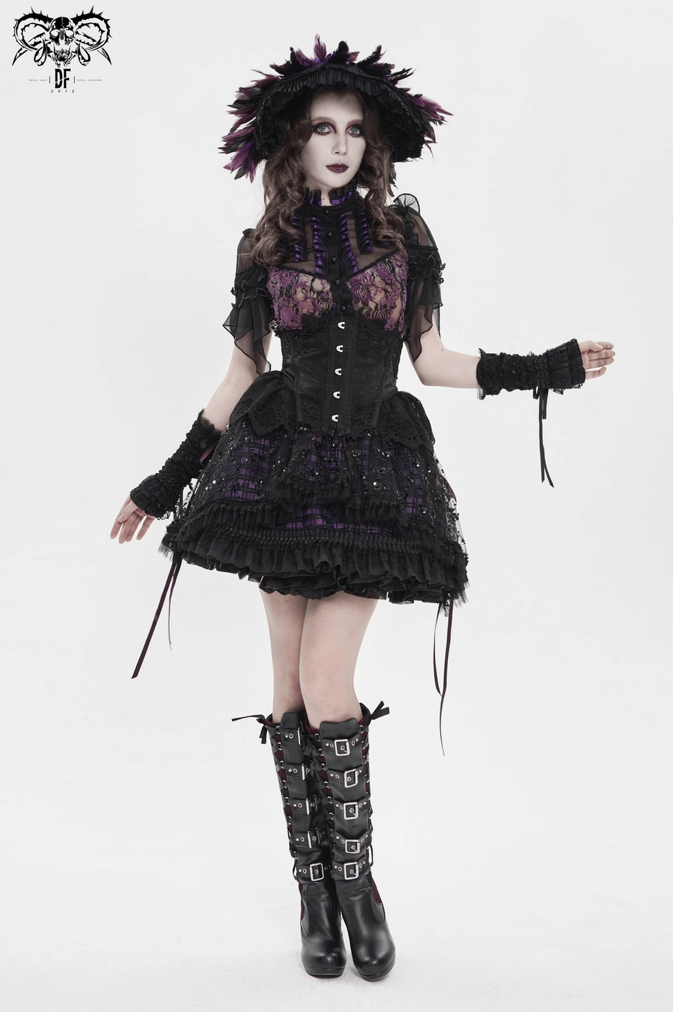 Gothic purple tulle skirt flat lay emphasizing the multi-layered construction combining plaid base, sequin mesh, and decorative elements
