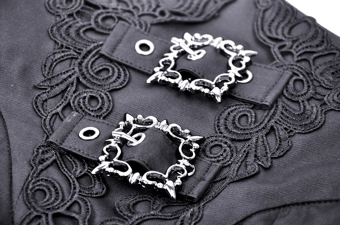 Close-up detail of ornate silver buckles and lace trim on gothic skirt corset waistband