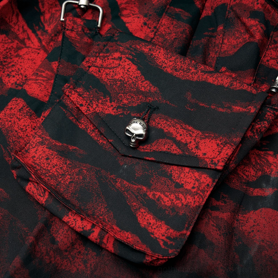 Close-up of side pocket with skull-shaped metal ornament, red-black flap, and metal hardware clasp detail