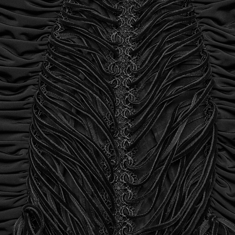 Close-up detail of ruched black stretchy fabric with lace trim on gothic maxi skirt
