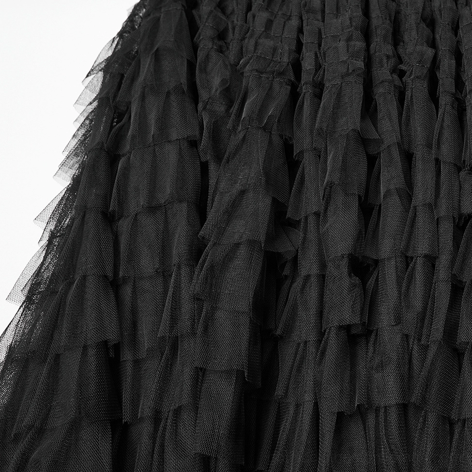 Black gothic layered tulle skirt-shorts hardware and stud embellishment close-up showing punk metal detailing