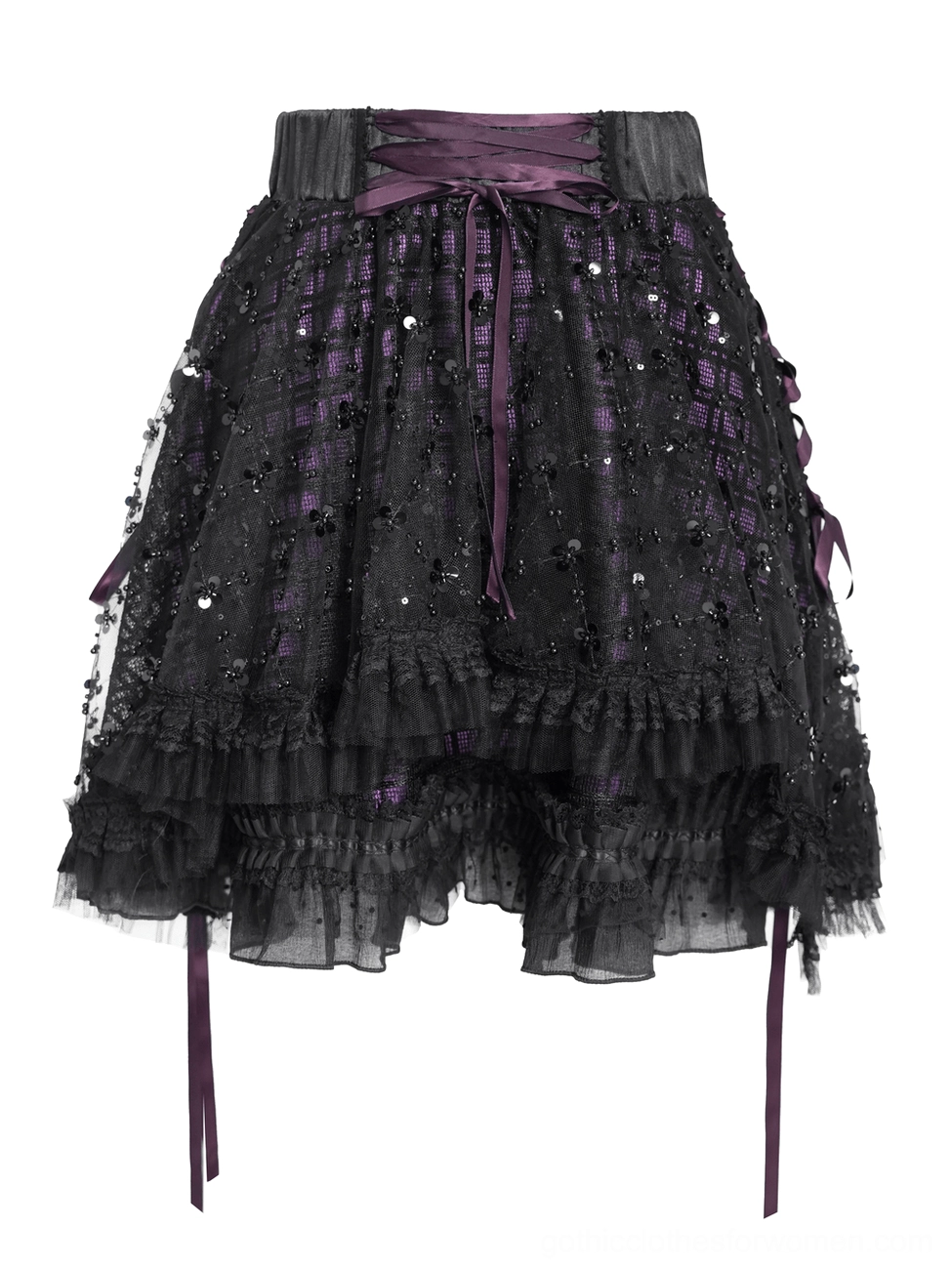 Side angle flat lay of purple gothic tulle skirt highlighting lace-up trim detail and tiered ruffle tulle layers for dimensional aesthetic