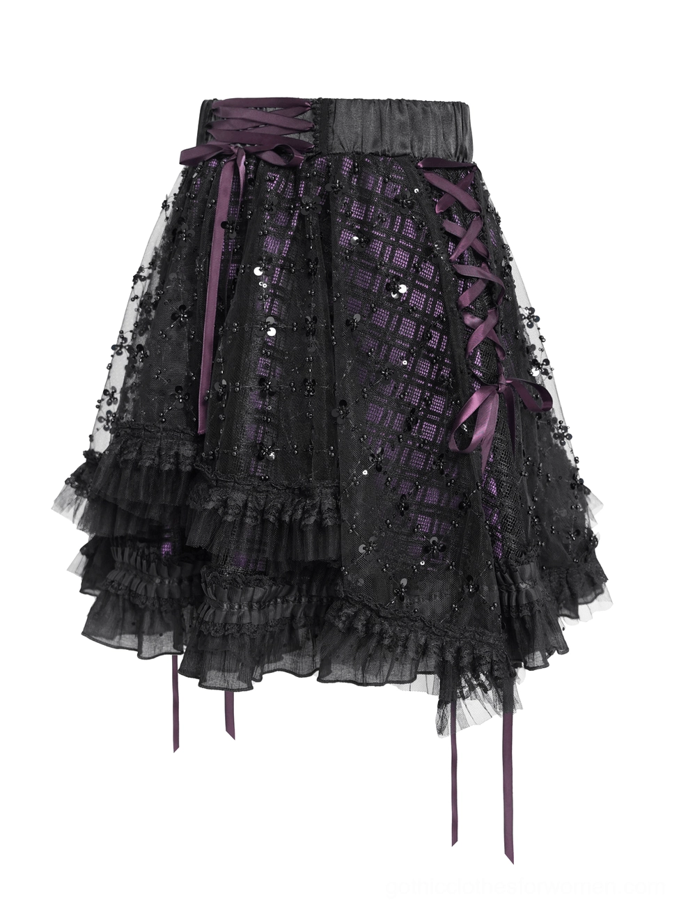 Side profile flat lay of gothic purple tulle skirt showing side lace-up trim, satin ribbon details, and asymmetrical ruffled hemline