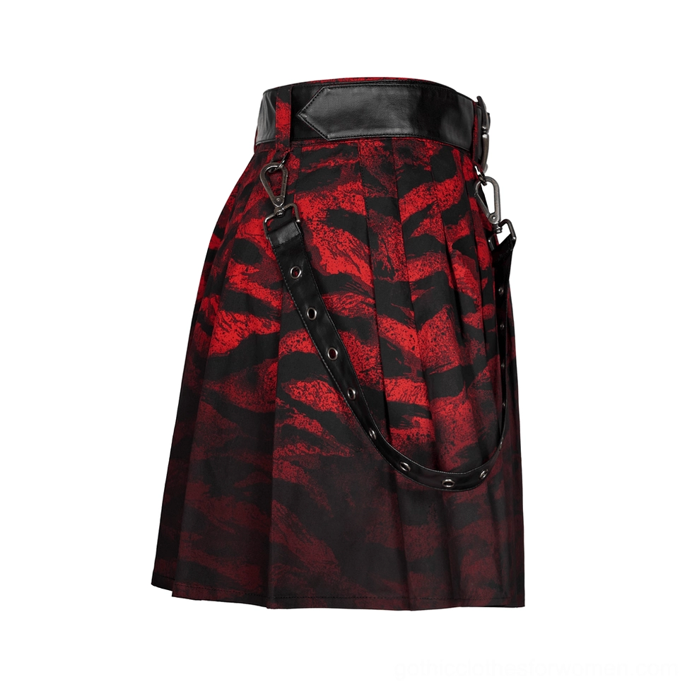 Side view flat lay of red-black abstract gothic A-line skirt with pleated fabric texture and metal strap accents