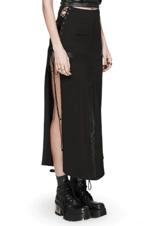 Gothic maxi skirt side profile showing adjustable drawstring detail, high slit, and platform boots pairing