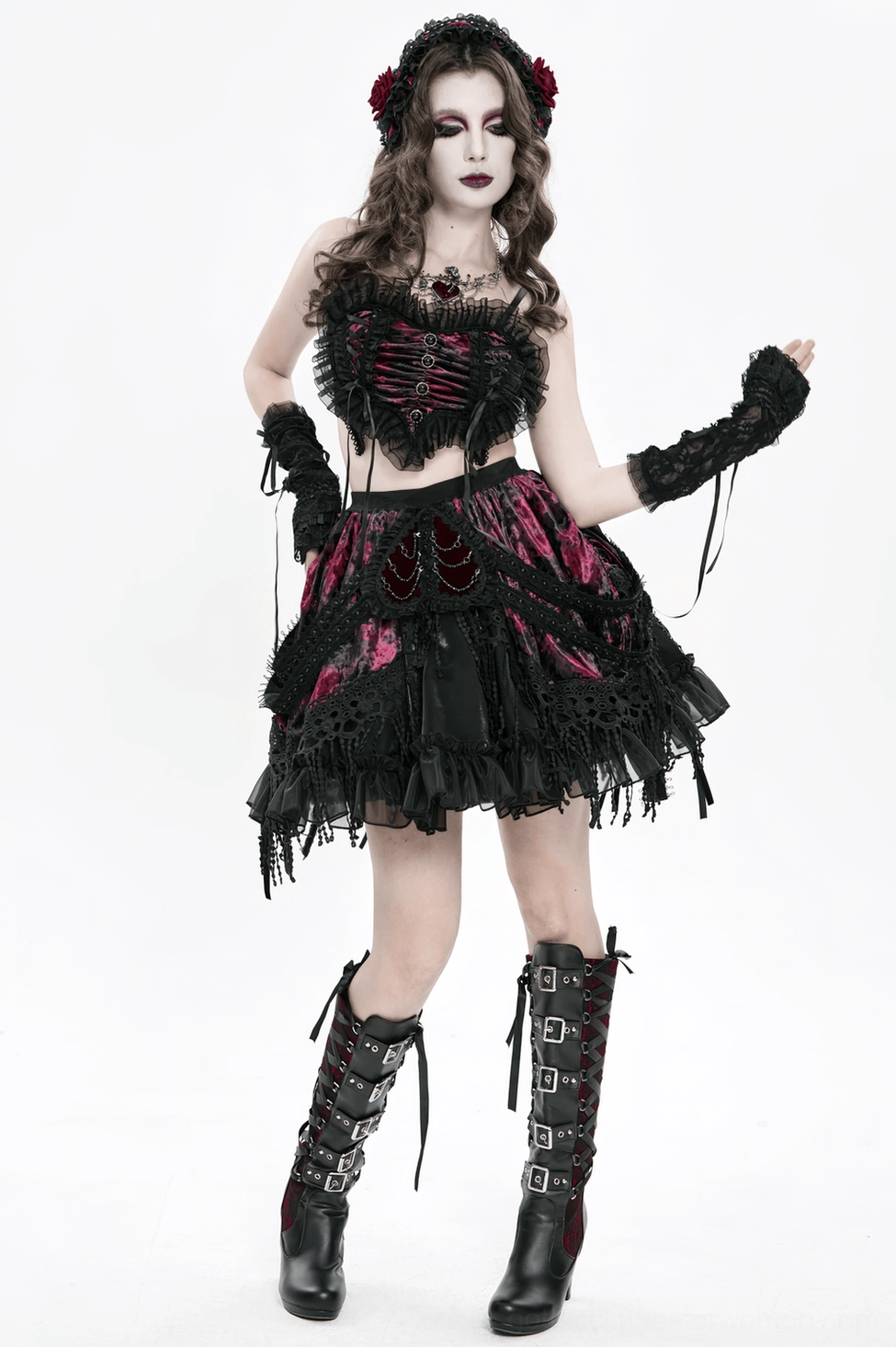 Alternative fashion gothic skirt paired with boots showing complete styling on model