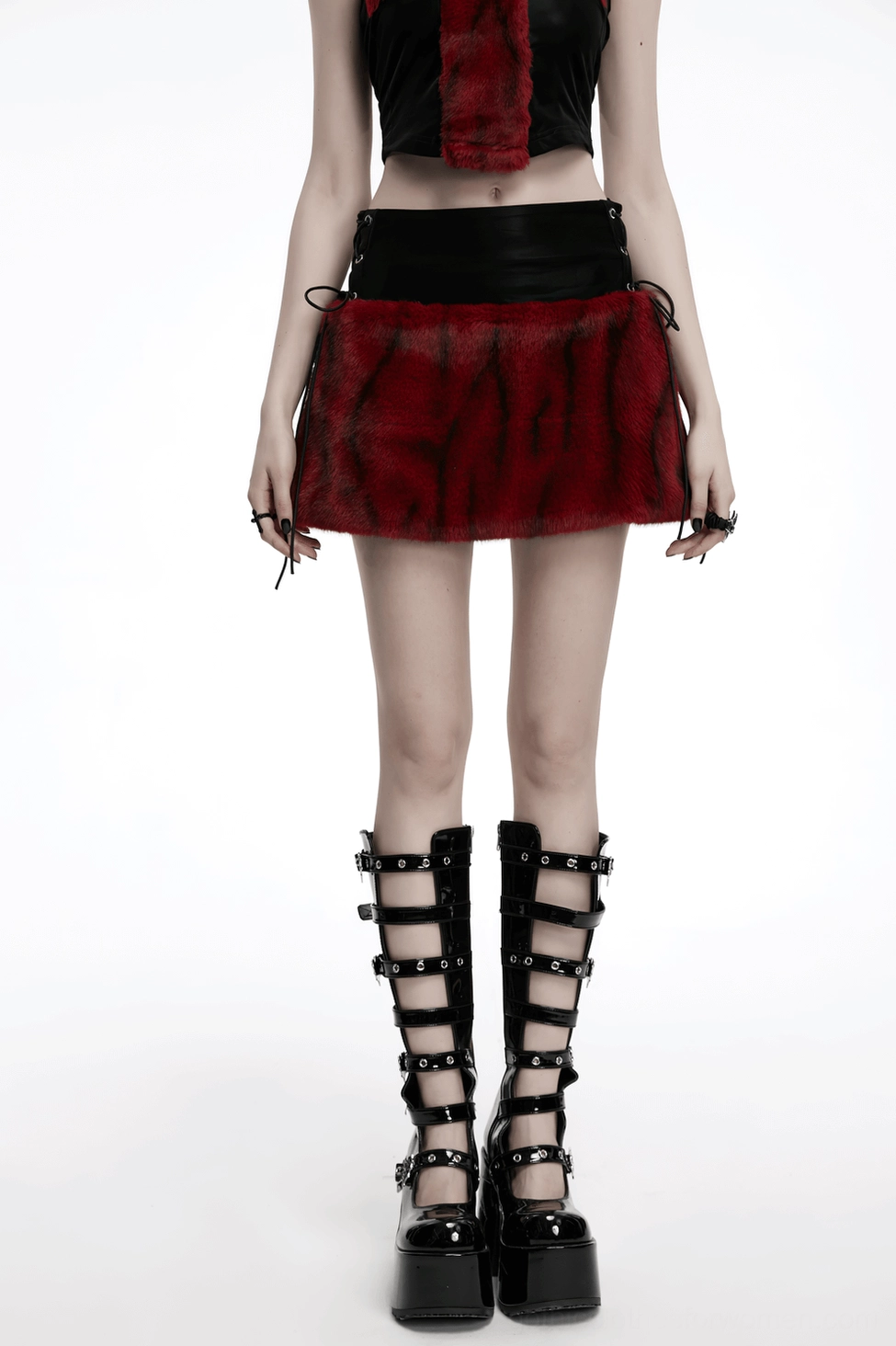 Styling view of gothic skirt paired with black platform boots demonstrating alternative fashion aesthetic