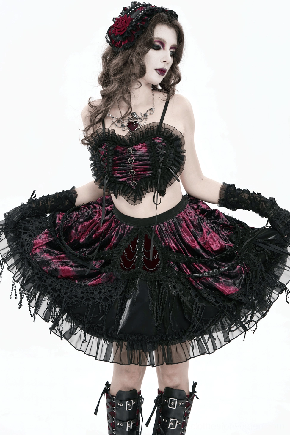 Gothic skirt hem detail showing layered tassels and ornate black lace trim finish