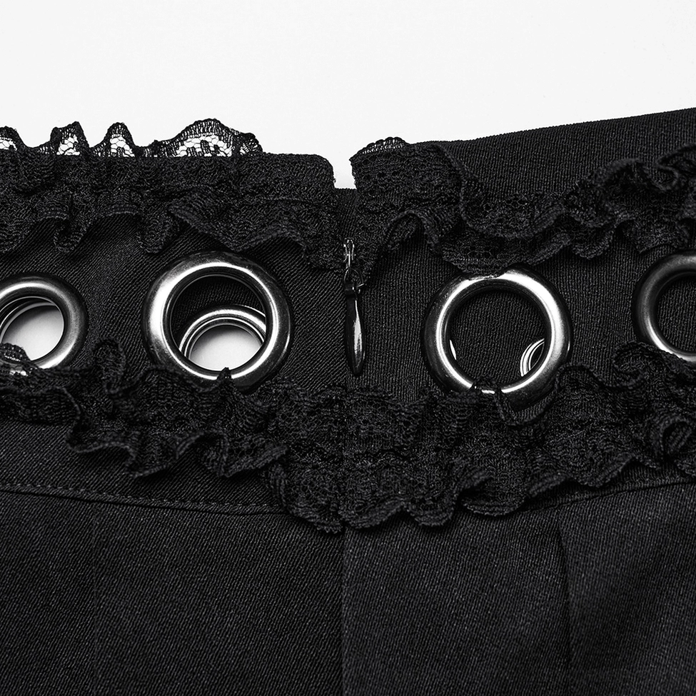 Close-up detail of black gothic skirt waistband showing large metal eyelets, black lace trim, and hidden zipper construction