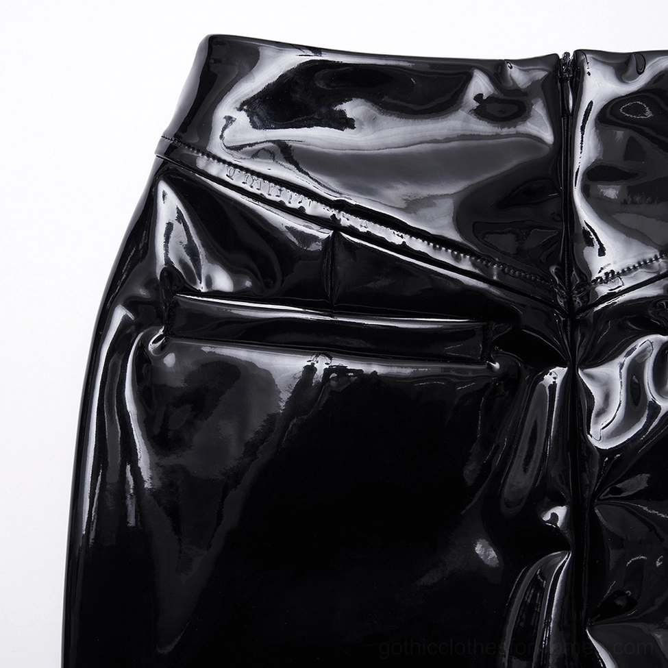 Close-up shot of gothic skirt waist area showing V-shaped waistband and faux back pocket details in patent leather