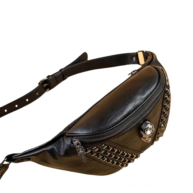 Close-up side view of gothic skull waist bag showing pyramid stud details and metal zipper hardware