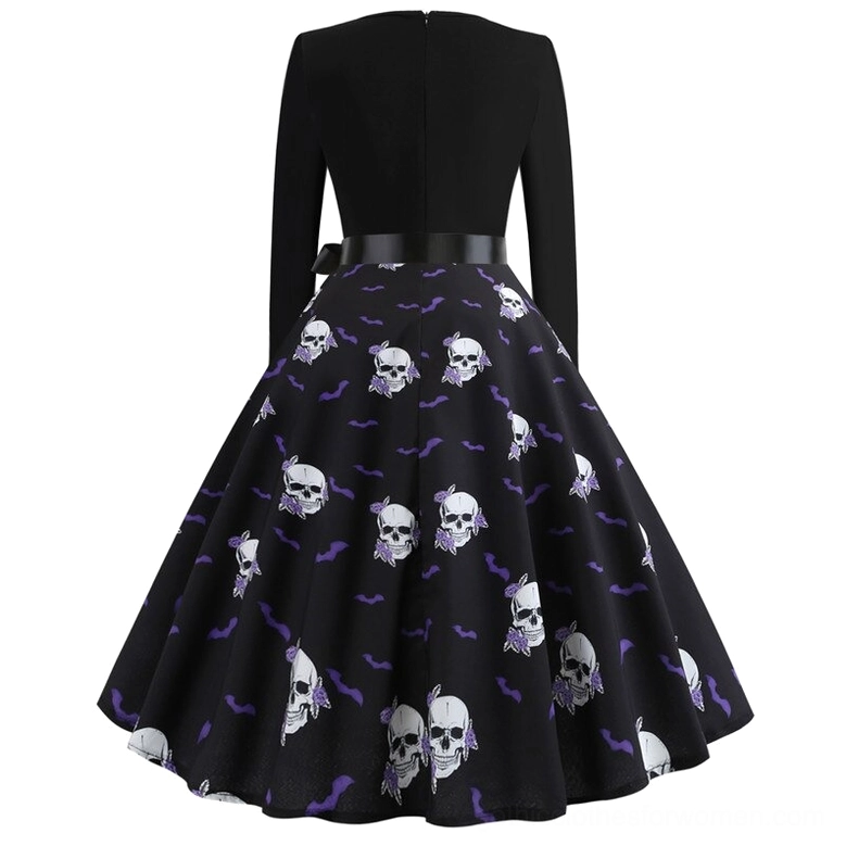 Gothic skull and bat print dress detail view with decorative waist bow sash