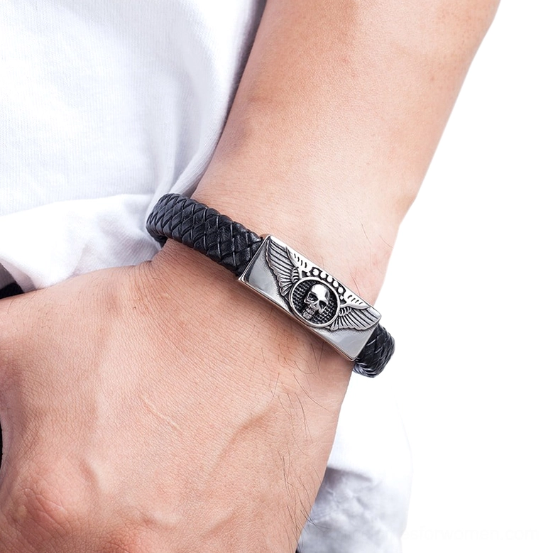Black gothic skull bracelet worn on male wrist - real-world wear perspective showing how magnetic clasp and leather fit on wrist