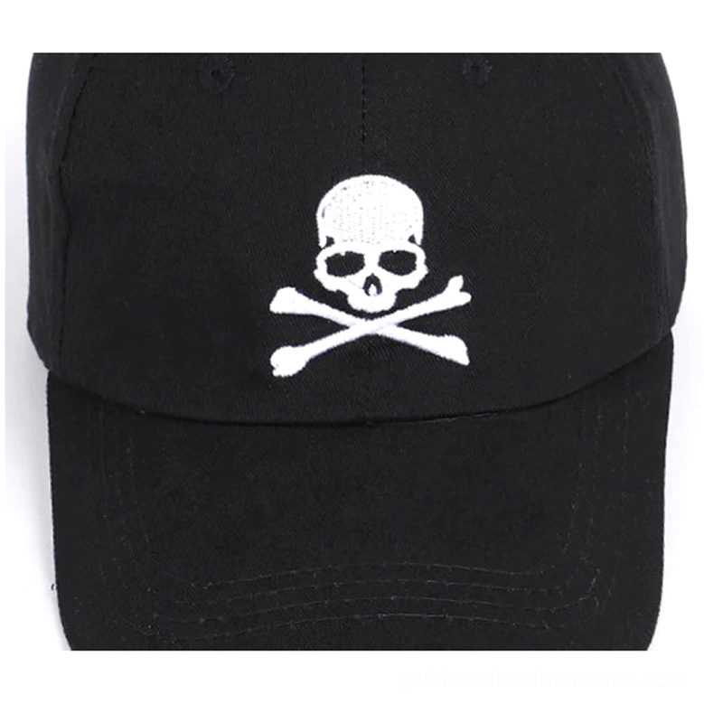 Detailed close-up of embroidered skull and crossbones design on black gothic baseball cap