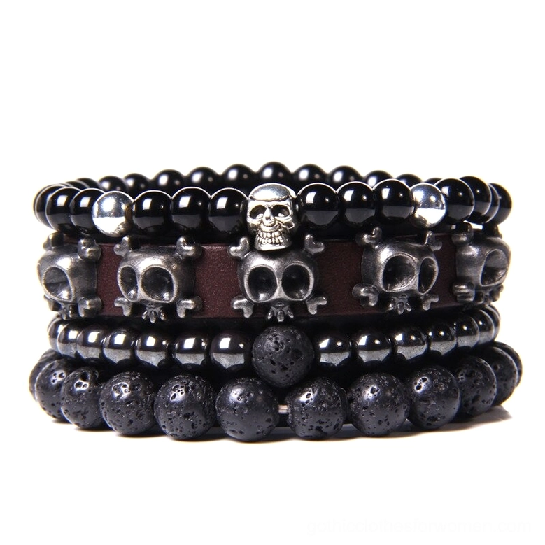 Gothic skull charm bracelet set with natural stone beads and vintage leather braided straps, multi-layer handmade dark jewelry collection displayed on white background