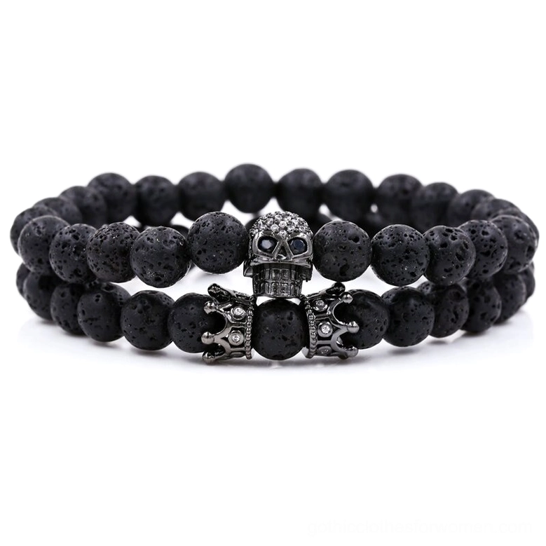 Black gunmetal skull and crown beaded gothic bracelet with porous lava stone, top view