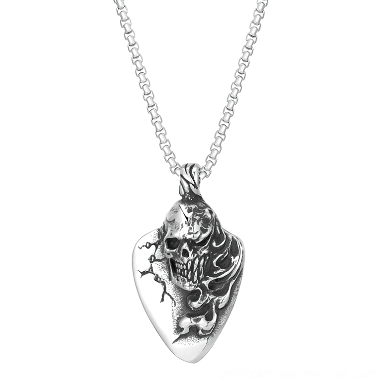 Gothic skull guitar pick pendant necklace in silver stainless steel, displayed on white studio background showing front full view of carved skull and intricate embossed flame details