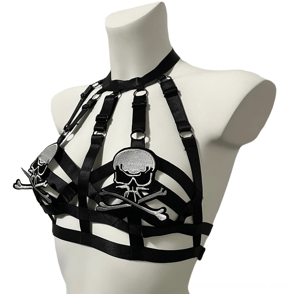 Black elastic gothic harness bra side front view featuring adjustable side fasteners and skull patch placement