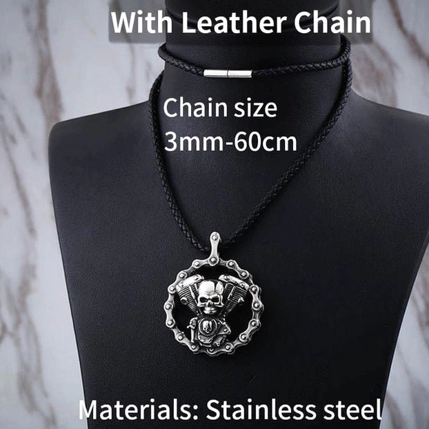 Gothic skull engine pendant necklace on black jewelry display mannequin - stainless steel pendant with leather cord styling option