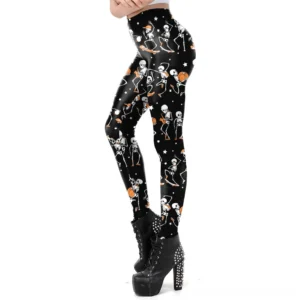 Black gothic leggings with skull and pumpkin print worn by woman in side rear three-quarter view showing full length ankle design