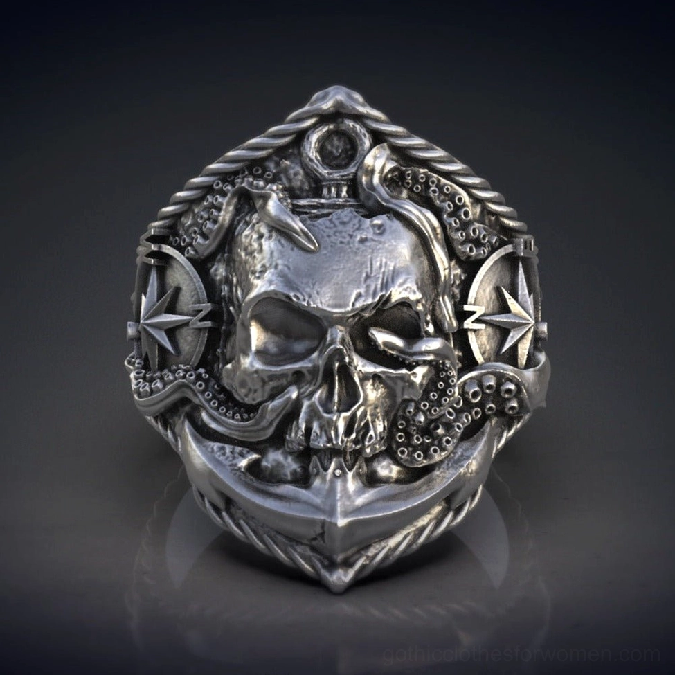 Gothic vintage skull compass anchor ring – close-up detail of antiqued silver metal with nautical biker motifs