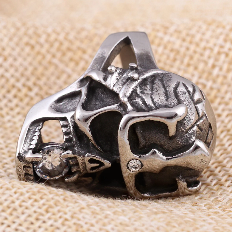 Gothic skull ring side rear showing crystal forehead accent and textured skull details