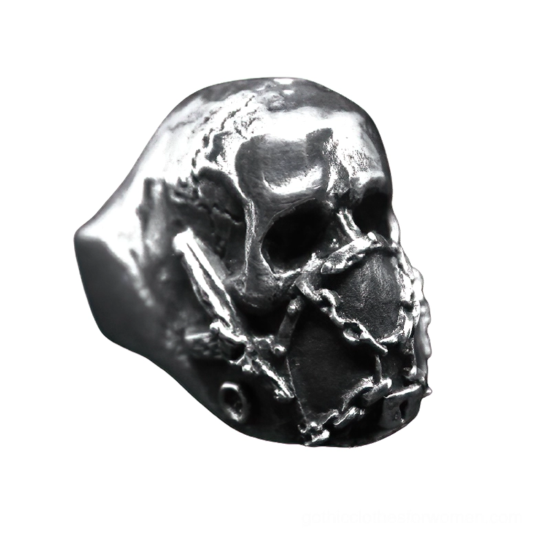 Detailed side view of gothic skull biker ring showing intricate chain wrapped mouth design and lock ornament