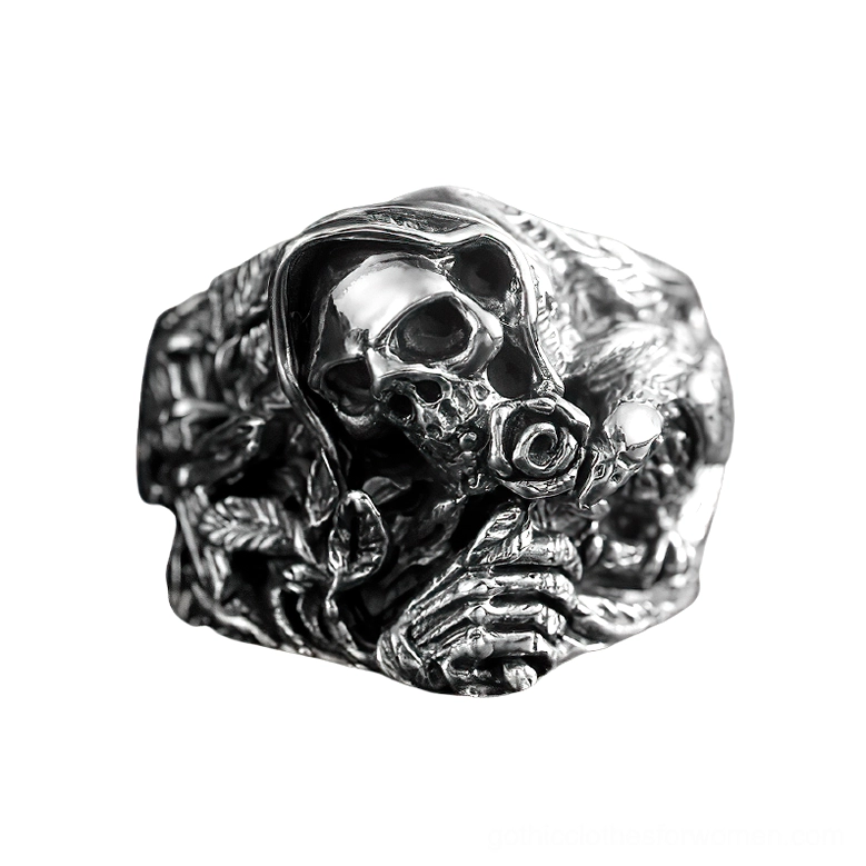Grim reaper skull gothic ring side profile showcasing skeletal hand carved details and floral engravings on band