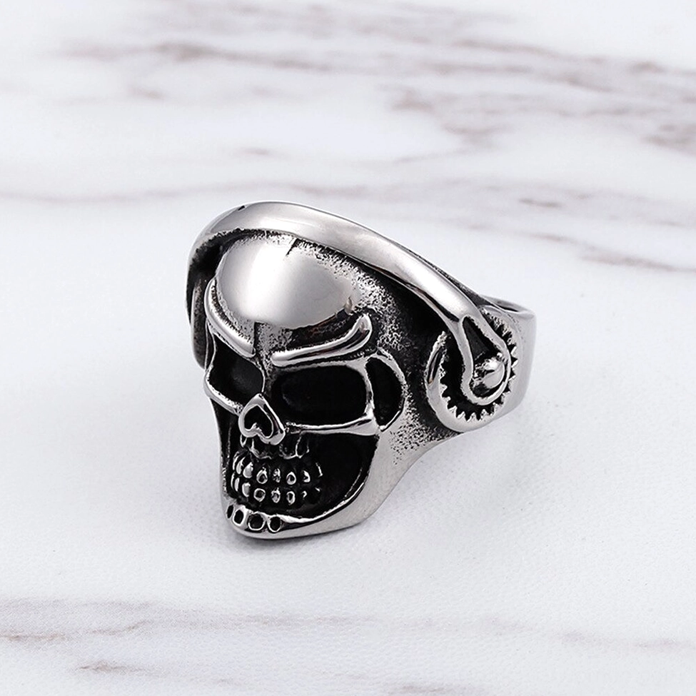 Gothic skull ring with distressed stainless steel finish and engraved features