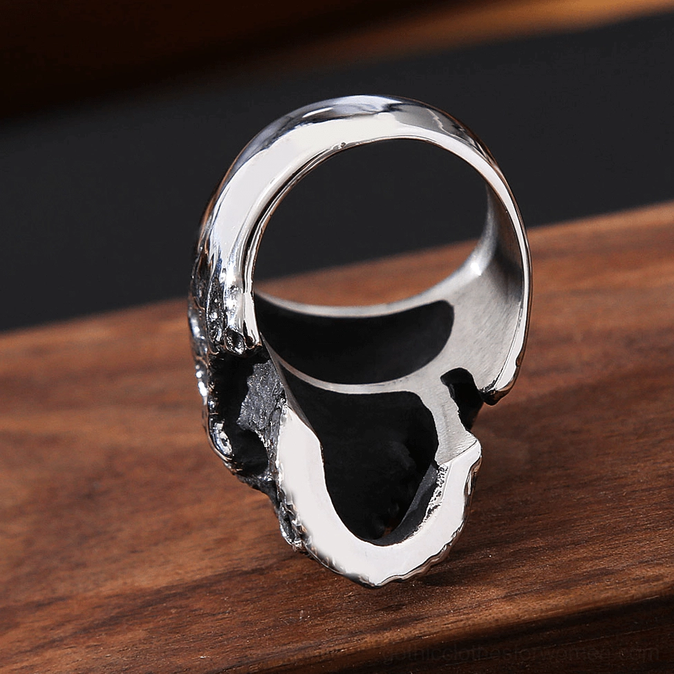 Gothic ring underside view showing hollow band structure and polished silver interior, exposed inner mechanics